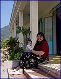 Marea holding Daniel at the orphanage.