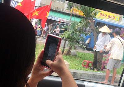 Adoptee takes photos in Vietnam