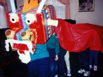 Children enjoy New Year dragon parade.